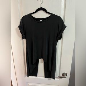 Woman’s medium open back, black shirt from M boutique